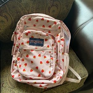 Jansport strawberry backpack it’s super cute and barely used also very clean